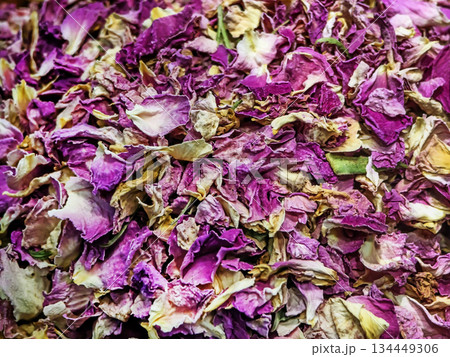 Dried rose petals in a pile from a local market in the afternoon during springtime Dried rose petals in a pile from a local market in the afternoon during springtime 134449306