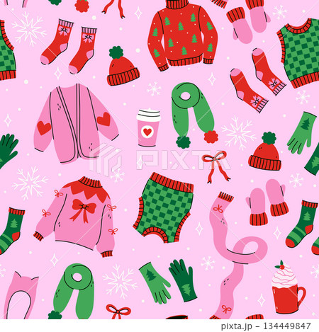 Seamless pattern with cute winter clothes and accessories. Vector graphics. 134449847