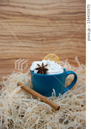 Coffee with marshmallows and carcin and star anise. Coffee with marshmallows and carcin and star anise. 134450970
