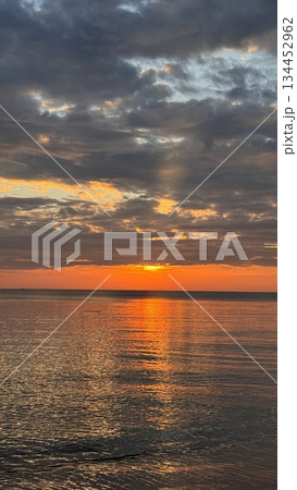 sunset over the sea sunset over the sea 134452962