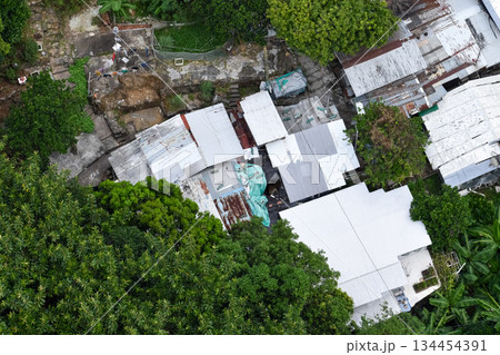 High angle view of squatter houses in rural in Hong Kong. Rural scene and living scene. High angle view of squatter houses in rural in Hong Kong. Rural scene and living scene. 134454391