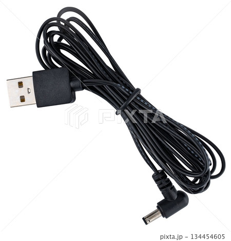Power cable with USB connector for charging electronic devices. On a white background Power cable with USB connector for charging electronic devices. On a white background 134454605