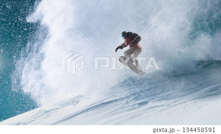 Action artwork. Powerful snowboarder jumping through deep snow on mountain slope. 134458591