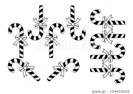 Black and white striped candy canes with ribbons in various positions, vector art illustration design template isolated on a white background. Black and white striped candy canes with ribbons in various positions, vector art illustration design template isolated on a white background. 134459205