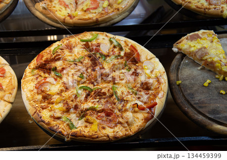 A roadside pizza stall selling Thai fusion pizzas. A roadside pizza stall selling Thai fusion pizzas. 134459399