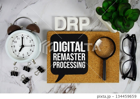 DRP - Digital Remaster Processing acronym with alarm clock and magnifying glass, Data management concept background DRP - Digital Remaster Processing acronym with alarm clock and magnifying glass, Data management concept background 134459659