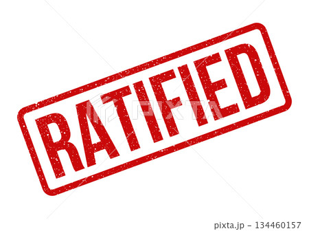 Gritty red rubber stamp impression confirming the formal approval or official endorsement of a document 134460157