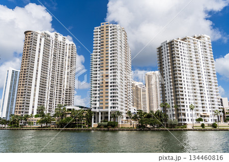 City downtown with skyscraper. Office building in business district. Brickell Key. Skyscraper building architecture. Residential skyscraper. Modern waterfront building. Skyscraper in business city 134460816