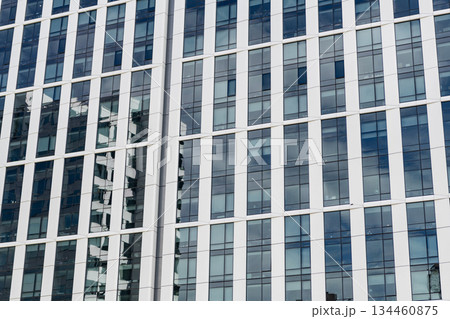 Building background. Glass building. Architectural detail. Background of architecture. Modern glass background. Glass facade. Minimalist background design. Architecture. Building facade architecture 134460875