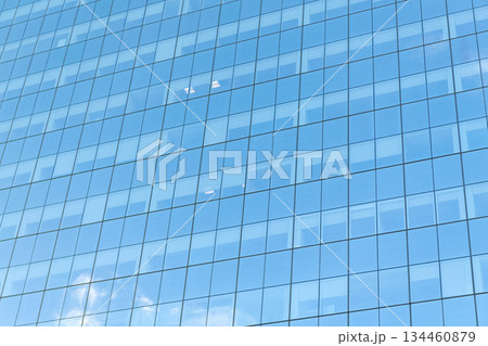 Architectural detail. Background of architecture. Modern glass background. Glass facade background. Architecture. Building facade architecture. Building skyscraper background. Glass building window 134460879