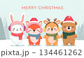 Cute animal characters celebrating Christmas in the snow with festive hats and scarves in a winter wonderland setting 134461262