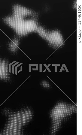 Abstract black and white halftone particle flow. Minimal dotted texture on dark background for modern design, data visualization, technology and editorial concepts. 134461650