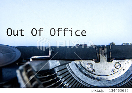Out of Office text on an old typewriter. Off work concept 134463653