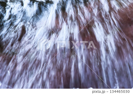 Rock in Flowing River Rock in Flowing River 134465030