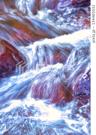 Group of Rocks in River with Smooth Water 134465032