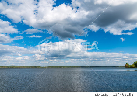 Blue lake with cloudy sky, natural background Blue lake with cloudy sky, natural background 134465198