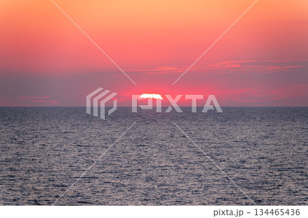 Beautiful red and orange sunrise over the sea. 134465436