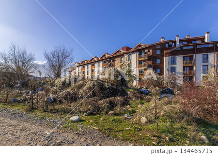 Bansko, Bulgaria houses and mountains 134465715