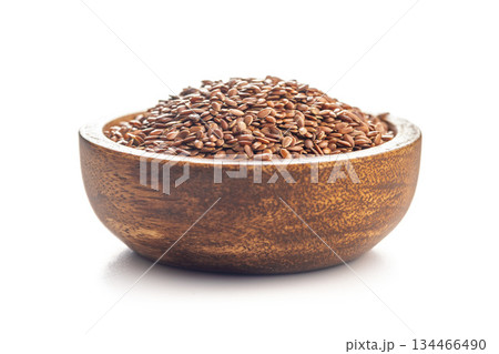 Linseed or flaxseed. Healthy flax seed in bowl isolated on white background. 134466490