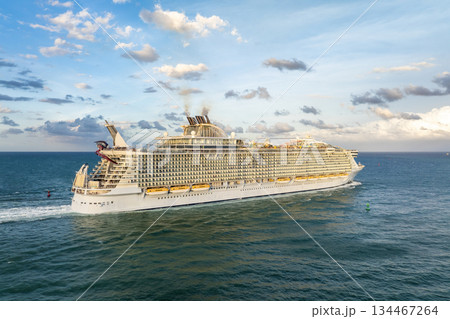 Aerial view of large cruise liner departing into Atlantic ocean from Miami port. Florida travel vacation concept 134467264