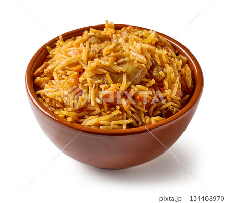 bowl of spicy rice with chicken meat and carrots 134468970