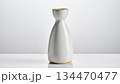 白い陶器で作られた日本酒の徳利とシンプルな背景 134470477