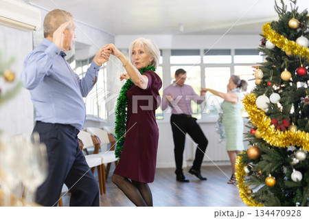 Elderly man and elderly woman dance twist 134470928