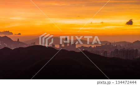 Golden Sunset Over City Skyline Behind Rolling Hills at Dusk Nov 10 2025 Golden Sunset Over City Skyline Behind Rolling Hills at Dusk Nov 10 2025 134472444