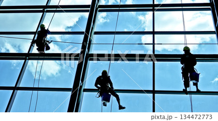 extreme work cleaning windows at height 134472773