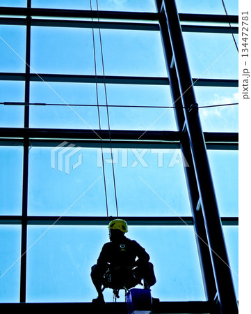 extreme work cleaning windows at height 134472781