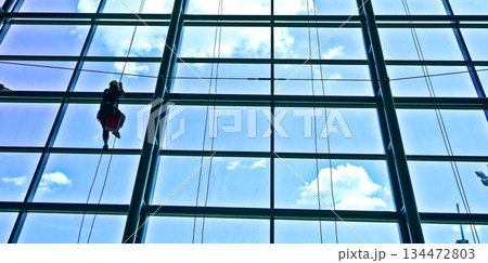extreme work cleaning windows at height extreme work cleaning windows at height 134472803