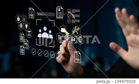 Futuristic Digital Interface with User Profile and Data Icons, Showcasing Business Management and Data Analytics Concept in Modern Environment Gantry Futuristic Digital Interface with User Profile and Data Icons, Showcasing Business Management and Data Analytics Concept in Modern Environment Gantry 134475028
