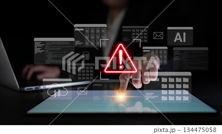 Digital alert notification with red warning symbol, futuristic interface, and user interaction in dark environment, highlighting cybersecurity awareness and technology innovation. Gantry Digital alert notification with red warning symbol, futuristic interface, and user interaction in dark environment, highlighting cybersecurity awareness and technology innovation. Gantry 134475058