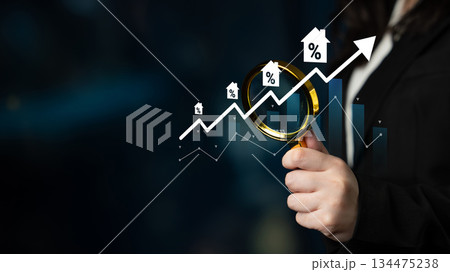 Business Person Holding Magnifying Glass with Growing Graph and Percent Symbols, Analyzing Market Trends and Opportunities in Finance Sector Gantry Business Person Holding Magnifying Glass with Growing Graph and Percent Symbols, Analyzing Market Trends and Opportunities in Finance Sector Gantry 134475238