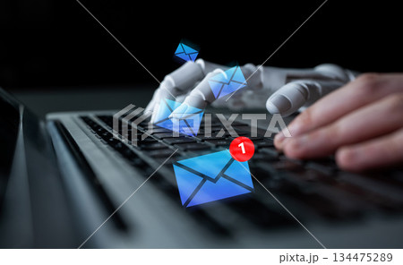 Futuristic Robot Hand Typing on Laptop Keyboard with Email Notifications and Iconic Envelope Illustrations Representing Digital Communication Technology Gantry Futuristic Robot Hand Typing on Laptop Keyboard with Email Notifications and Iconic Envelope Illustrations Representing Digital Communication Technology Gantry 134475289
