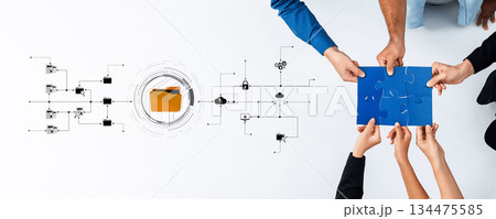 Collaborative team working on digital file management and data organization, showcasing hands joining puzzle piece and folder for integration concepts Trope Collaborative team working on digital file management and data organization, showcasing hands joining puzzle piece and folder for integration concepts Trope 134475585