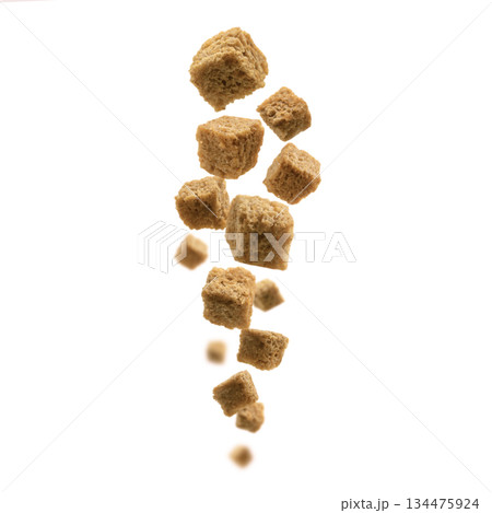 Bread croutons levitate on a white background 134475924