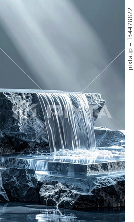 Gentle waterfall cascades over textured rocks with ethereal light beams filtering through a muted sky Gentle waterfall cascades over textured rocks with ethereal light beams filtering through a muted sky 134478822