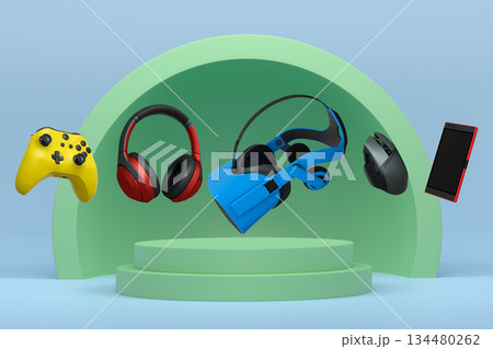 Collection of gaming gadgets like controllers, VR glasses, phone and headphones over podium on abstract pastel background 134480262