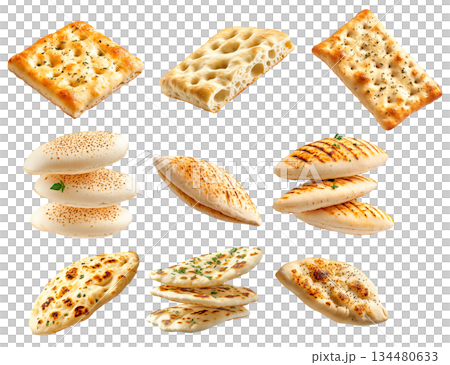 Various types of flatbreads and pita breads arranged on white background, showing texture and variety, concept of traditional food 134480633