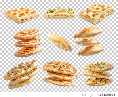 Various types of flatbreads and pita breads arranged on white background, showing texture and variety, concept of traditional food 134480634