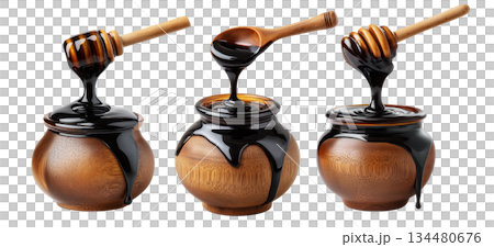 Set of Egyp Molasses black syrup jar splashing from a polished jar, isolated on white background, concept of Arabic Cuisine Set of Egyp Molasses black syrup jar splashing from a polished jar, isolated on white background, concept of Arabic Cuisine 134480676