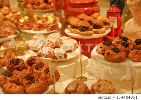Assortment of Homemade Scones Displayed in a Bakery Cafe 134484951
