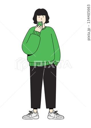 Woman in Green Sweater Taking Selfie Woman in Green Sweater Taking Selfie 134485663
