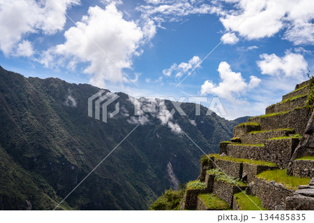 Ancient terraces and stone walls inside the Machu Picchu site in Peru 134485835