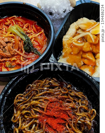 Spicy jjampong with seafood and noodles, savory jajangmyeon with rich black bean sauce, and crispy tangsuyuk in sweet and sour glaze. A perfect trio of bold flavors and satisfying textures. 134486234