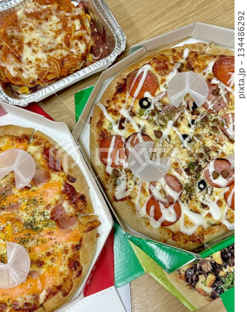 A delicious pizza with a golden crust, melted cheese, and savory toppings. Perfect for food-related designs, menus, or Italian-themed projects, capturing the essence of a classic comfort dish. A delicious pizza with a golden crust, melted cheese, and savory toppings. Perfect for food-related designs, menus, or Italian-themed projects, capturing the essence of a classic comfort dish. 134486292