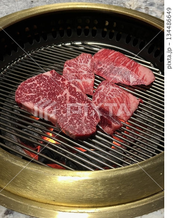 Premium-quality Hanwoo beef with rich marbling and tender texture, prized for its deep, buttery flavor. A luxurious choice for Korean BBQ and fine dining experiences. Premium-quality Hanwoo beef with rich marbling and tender texture, prized for its deep, buttery flavor. A luxurious choice for Korean BBQ and fine dining experiences. 134486649