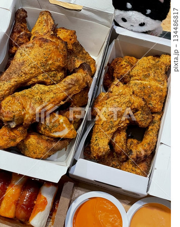 Crispy fried chicken with golden, crunchy skin and juicy, tender meat. A delicious and savory dish, perfect for any meal, served with dipping sauces or side dishes for extra flavor! Crispy fried chicken with golden, crunchy skin and juicy, tender meat. A delicious and savory dish, perfect for any meal, served with dipping sauces or side dishes for extra flavor! 134486817