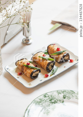 Georgian eggplant rolls with walnut filling Georgian eggplant rolls with walnut filling 134487828